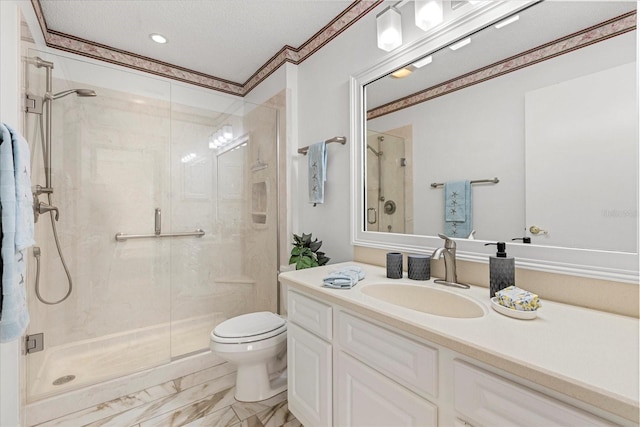 full bathroom with a shower stall, marble finish floor, ornamental molding, toilet, and vanity