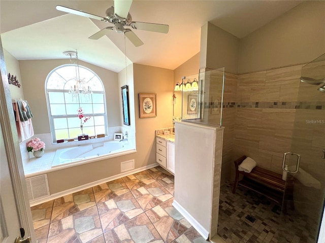 4638 River Ridge Drive, Leesburg, FL 34748 - bathroom with visible vents, a tile shower, ceiling fan with notable chandelier, a bath, and vanity