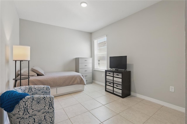 1158 Oak Bluff Dr, Davenport, FL 33837 - bedroom with light tile patterned flooring and baseboards