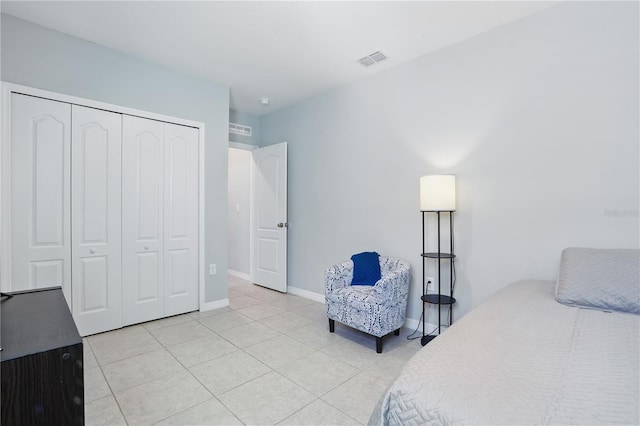 1158 Oak Bluff Dr, Davenport, FL 33837 - bedroom featuring a closet and light tile patterned floors