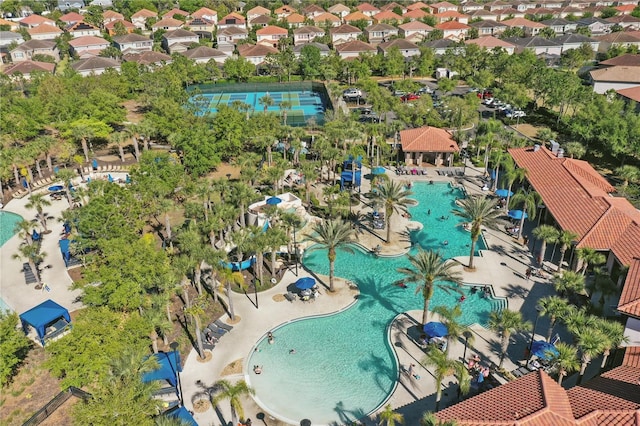 1158 Oak Bluff Dr, Davenport, FL 33837 - aerial perspective of suburban area with a pool