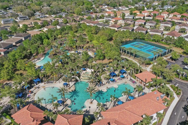 1158 Oak Bluff Dr, Davenport, FL 33837 - aerial perspective of suburban area featuring a pool