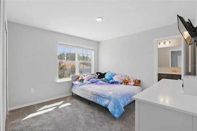 1158 Oak Bluff Dr, Davenport, FL 33837 - carpeted bedroom featuring a sink and connected bathroom