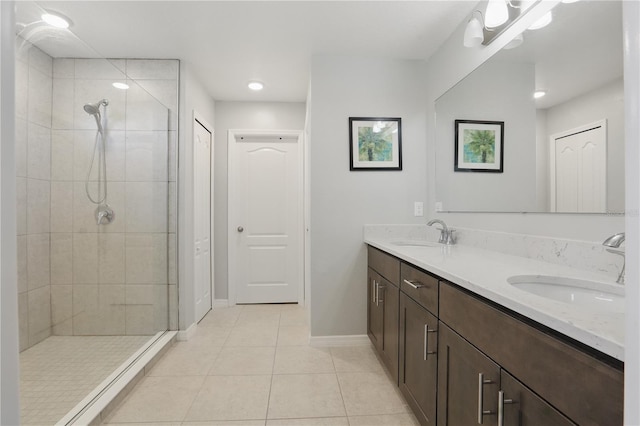 1158 Oak Bluff Dr, Davenport, FL 33837 - full bath featuring tile patterned floors, double vanity, a tile shower, and recessed lighting