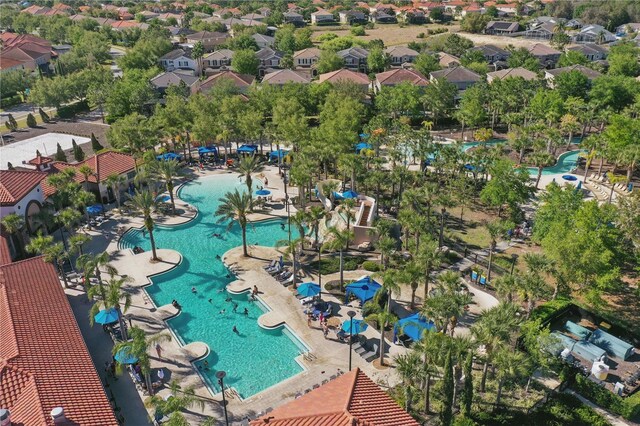 1158 Oak Bluff Dr, Davenport, FL 33837 - aerial perspective of suburban area featuring a pool area