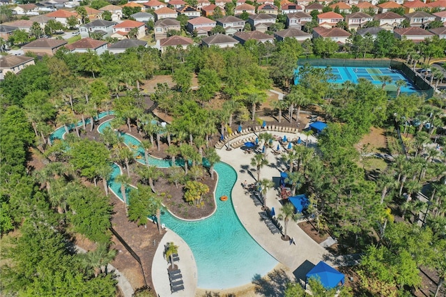 1158 Oak Bluff Dr, Davenport, FL 33837 - aerial view of property and surrounding area featuring a pool area