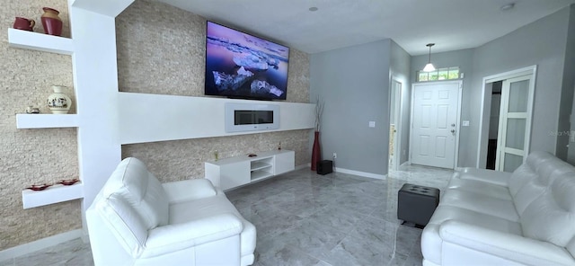 4730 Capital Blvd, Saint Cloud, FL 34769 - living area featuring baseboards and built in features