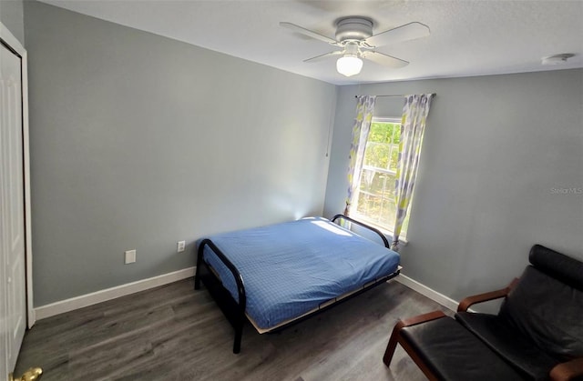 4730 Capital Blvd, Saint Cloud, FL 34769 - bedroom with baseboards, ceiling fan, and wood finished floors