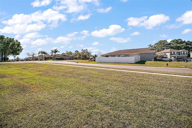 view of yard featuring fence