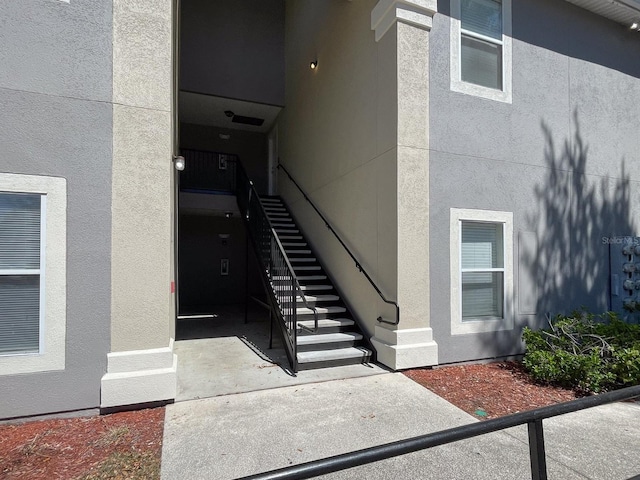 5151 Playpen Dr Unit 2, Jacksonville, FL 32210 - doorway to property with stucco siding