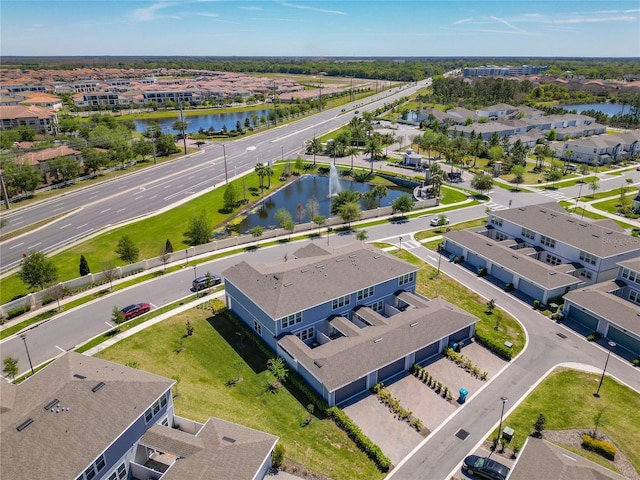 aerial view featuring a residential view and a water view
