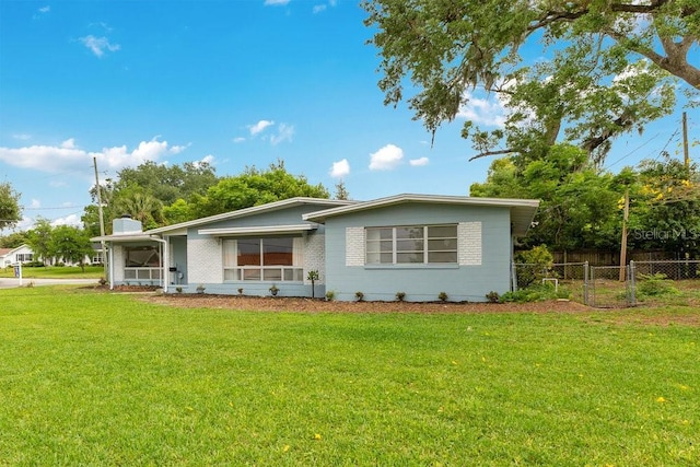 3107 Troy Dr, Orlando, FL 32806 - view of front of house featuring a front yard and fence