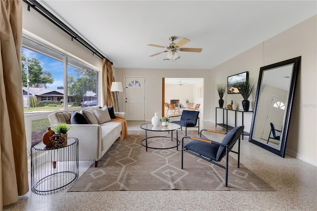 3107 Troy Dr, Orlando, FL 32806 - living area featuring speckled floor and a ceiling fan