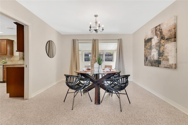 3107 Troy Dr, Orlando, FL 32806 - dining space with a chandelier, light carpet, and baseboards
