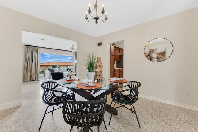 3107 Troy Dr, Orlando, FL 32806 - dining room with a notable chandelier, baseboards, and light speckled floor