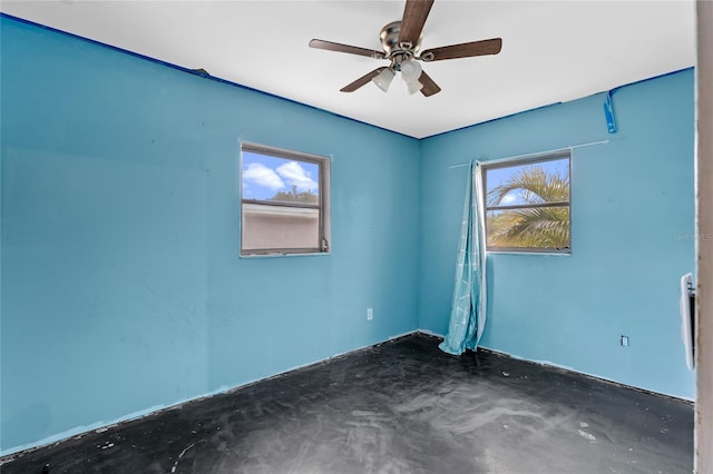 6031 W Ridgewood Ave, Orlando, FL 32835 - spare room with ceiling fan and healthy amount of natural light