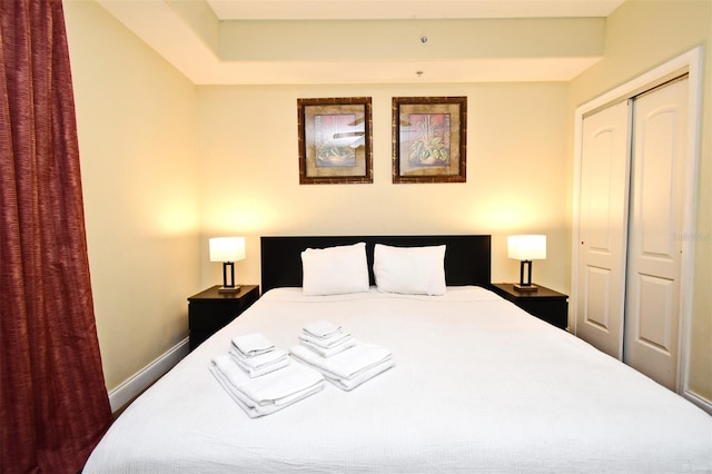 13427 Blue Heron Beach Dr Unit 1802, Orlando, FL 32821 - bedroom featuring baseboards and a closet