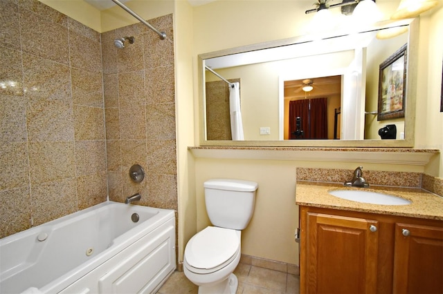13427 Blue Heron Beach Dr Unit 1802, Orlando, FL 32821 - bathroom with baseboards, toilet, vanity, shower / tub combination, and tile patterned flooring