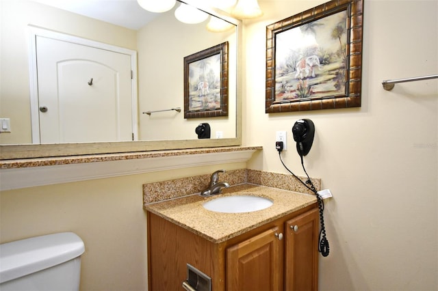 13427 Blue Heron Beach Dr Unit 1802, Orlando, FL 32821 - bathroom with toilet and vanity
