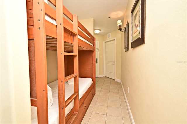 13427 Blue Heron Beach Dr Unit 1802, Orlando, FL 32821 - hall with light tile patterned flooring, visible vents, and baseboards
