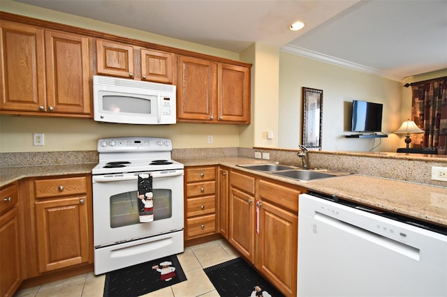 13427 Blue Heron Beach Dr Unit 1802, Orlando, FL 32821 - kitchen with a sink, brown cabinets, light tile patterned flooring, and white appliances