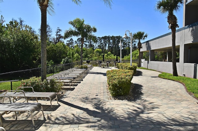 13427 Blue Heron Beach Dr Unit 1802, Orlando, FL 32821 - surrounding community featuring a patio and fence