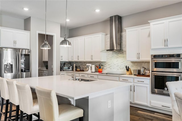 8384 Ludington Cir, Orlando, FL 32836 - kitchen with wall chimney range hood, a sink, appliances with stainless steel finishes, and backsplash