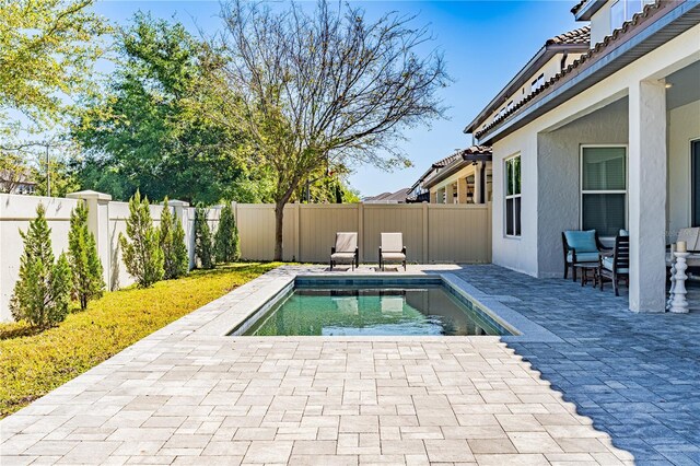 8384 Ludington Cir, Orlando, FL 32836 - view of swimming pool featuring a fenced backyard, a fenced in pool, and a patio area