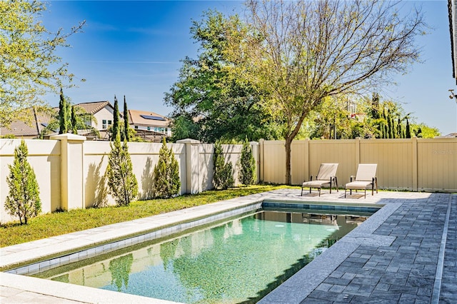 8384 Ludington Cir, Orlando, FL 32836 - view of pool featuring a fenced backyard, a fenced in pool, and a patio