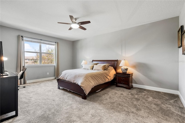 8384 Ludington Cir, Orlando, FL 32836 - bedroom with carpet flooring, baseboards, ceiling fan, and a textured ceiling