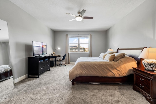 8384 Ludington Cir, Orlando, FL 32836 - bedroom with light colored carpet, ceiling fan, and baseboards