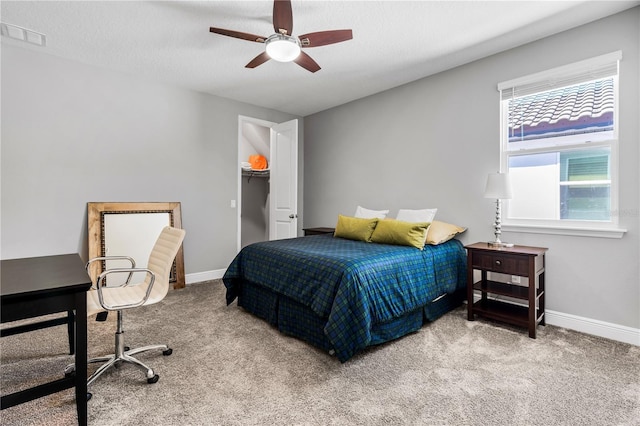 8384 Ludington Cir, Orlando, FL 32836 - bedroom with baseboards, visible vents, ceiling fan, and carpet