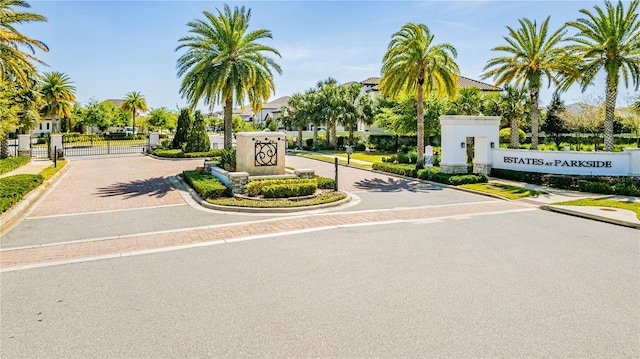 8384 Ludington Cir, Orlando, FL 32836 - community sign with a residential view and a gate