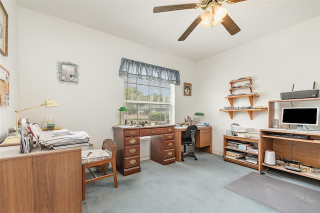 office area with light colored carpet and ceiling fan