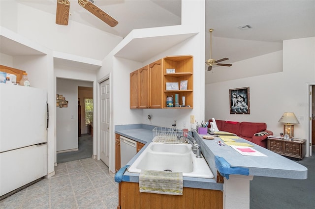 kitchen featuring open shelves, white appliances, a sink, a ceiling fan, and a peninsula