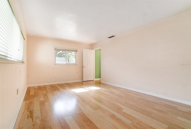 690 S Lakemont Ave, Winter Park, FL 32792 - unfurnished room with light wood-type flooring and baseboards