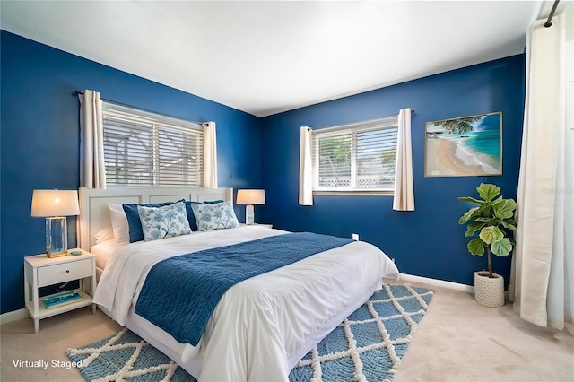 690 S Lakemont Ave, Winter Park, FL 32792 - carpeted bedroom with baseboards