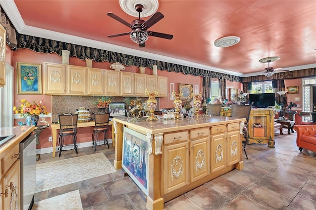 kitchen featuring light brown cabinetry, backsplash, dishwasher, and a ceiling fan
