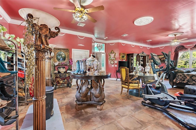 interior space with visible vents, ceiling fan, and ornamental molding