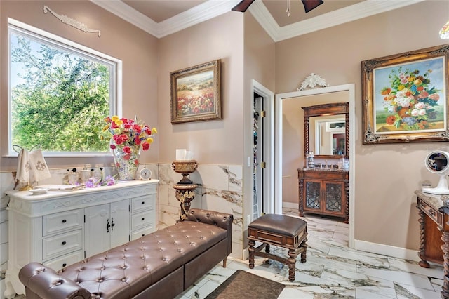 bathroom with marble finish floor, vanity, crown molding, and ceiling fan