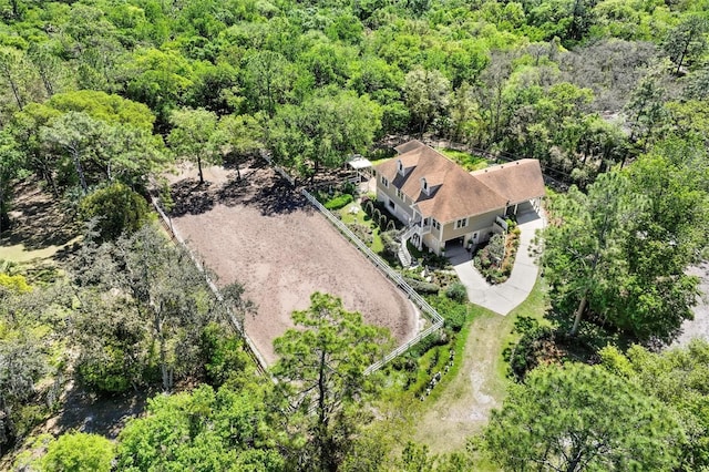 aerial view with a wooded view