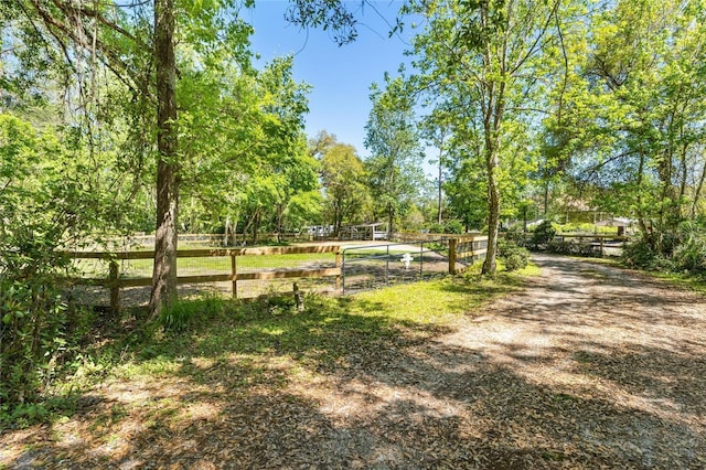 surrounding community featuring fence