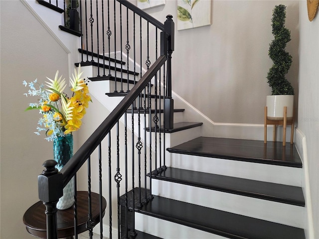 15149 Canoe Pl, Winter Garden, FL 34787 - staircase featuring baseboards