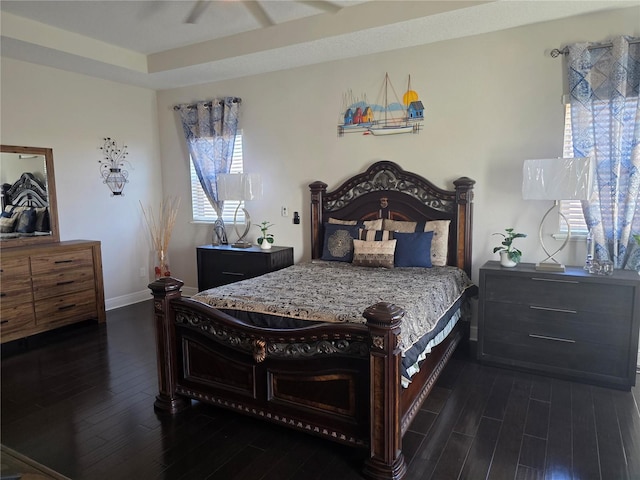 15149 Canoe Pl, Winter Garden, FL 34787 - bedroom with baseboards and dark wood-style flooring