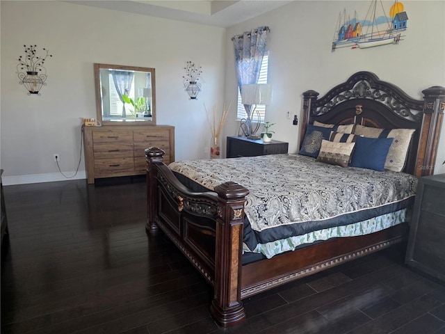 15149 Canoe Pl, Winter Garden, FL 34787 - bedroom with baseboards and wood finished floors