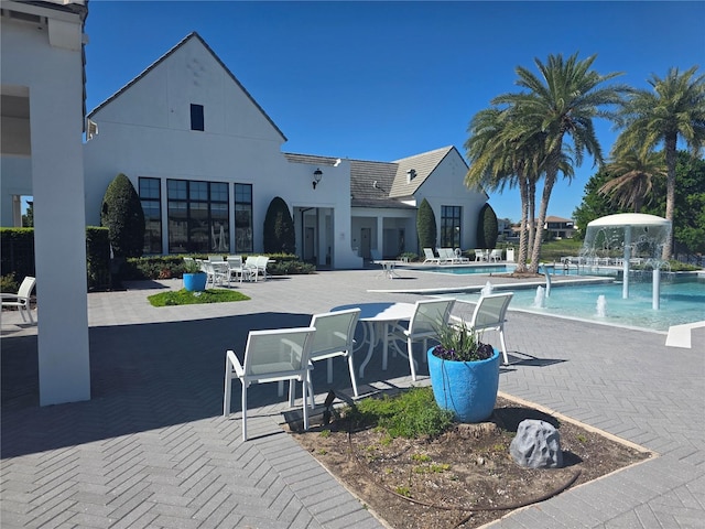 15149 Canoe Pl, Winter Garden, FL 34787 - community pool featuring a patio area