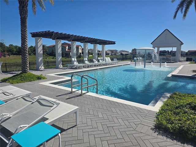 15149 Canoe Pl, Winter Garden, FL 34787 - community pool featuring a patio area, a gazebo, fence, and a pergola