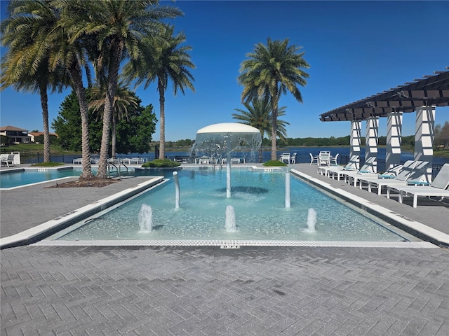 15149 Canoe Pl, Winter Garden, FL 34787 - community pool featuring a pergola and a patio area