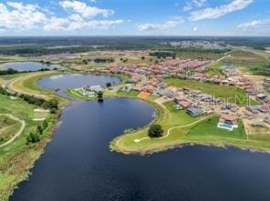 15149 Canoe Pl, Winter Garden, FL 34787 - drone / aerial view with a water view