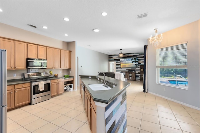 640 Brookfield Pl, Apopka, FL 32712 - kitchen with dark countertops, visible vents, a sink, and stainless steel appliances